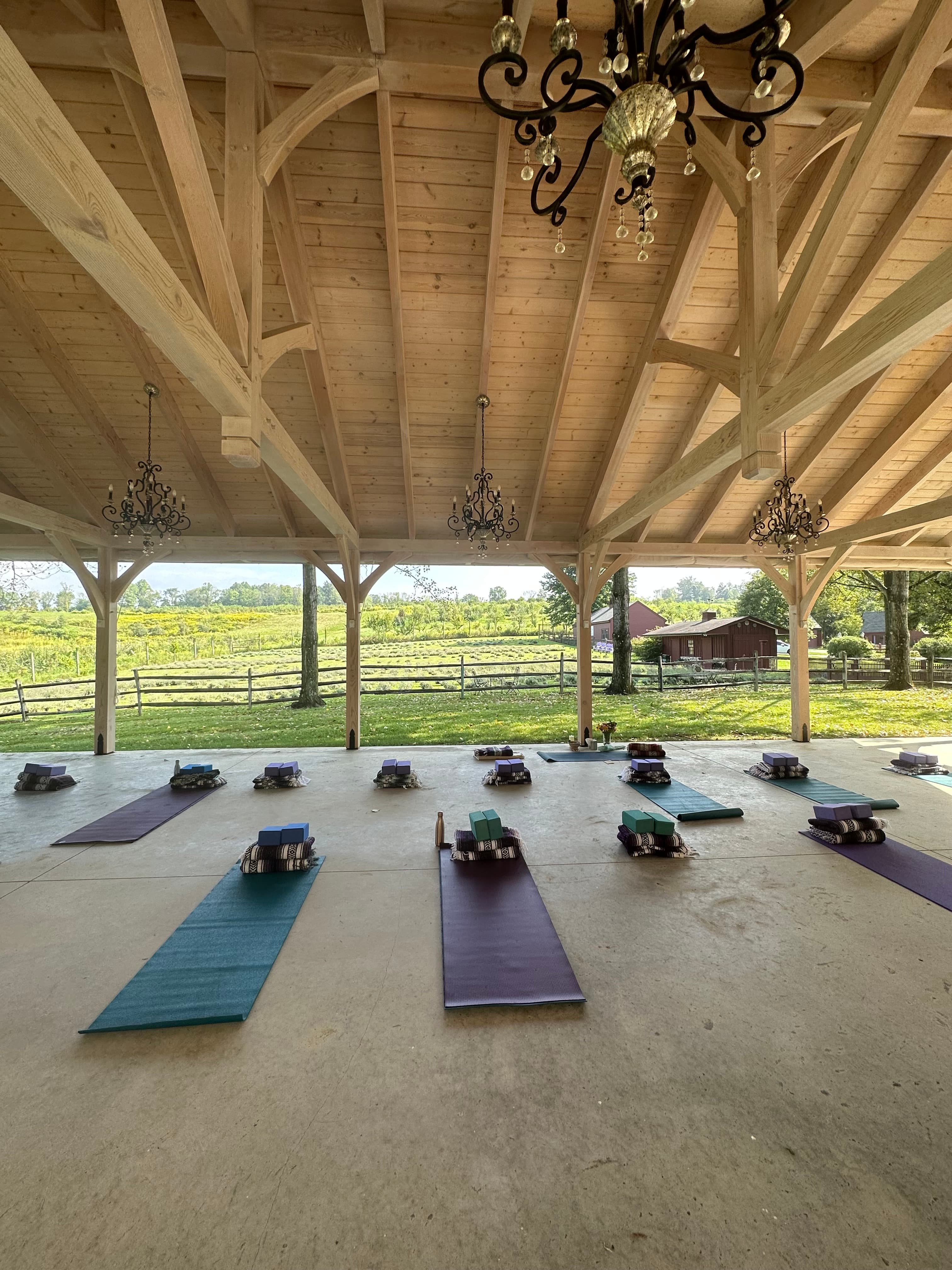 Yoga mats set up in beautiful barn venue overlooking lavender fields